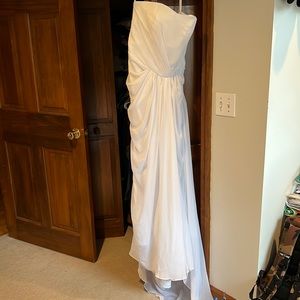Wedding dress, white, size 8-10. Never worn.
